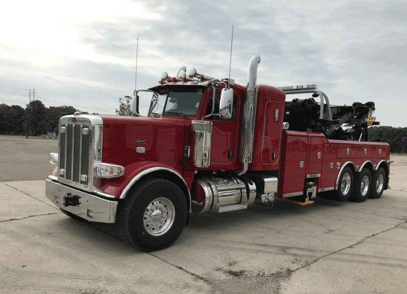 Heavy-duty tow truck on Interstate 70 near Effingham IL preparing for a long-distance haul